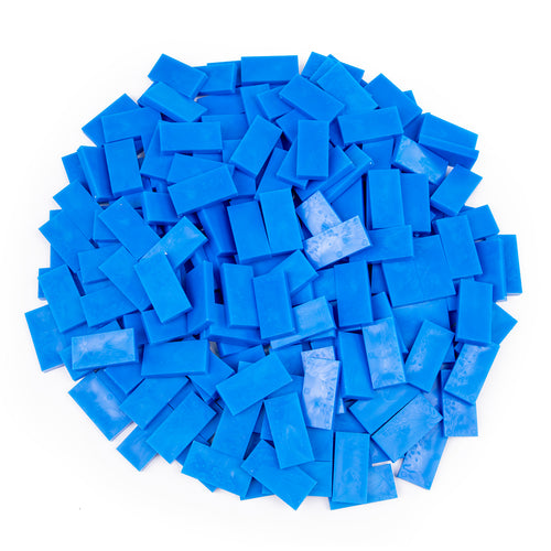 blue dominoes pile of bulk dominoes